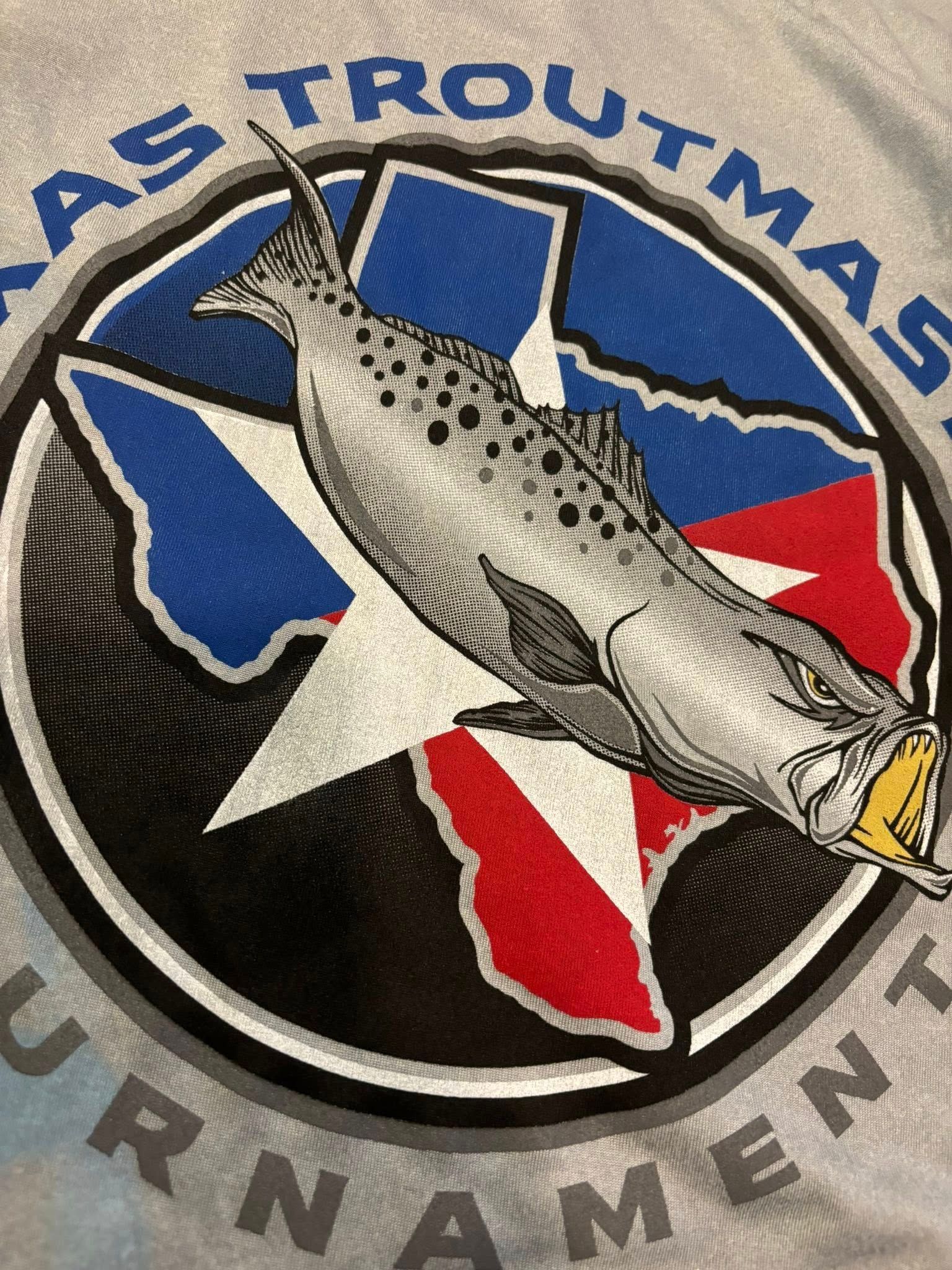 Logo: Spotted trout with open mouth over Texas star design. 
