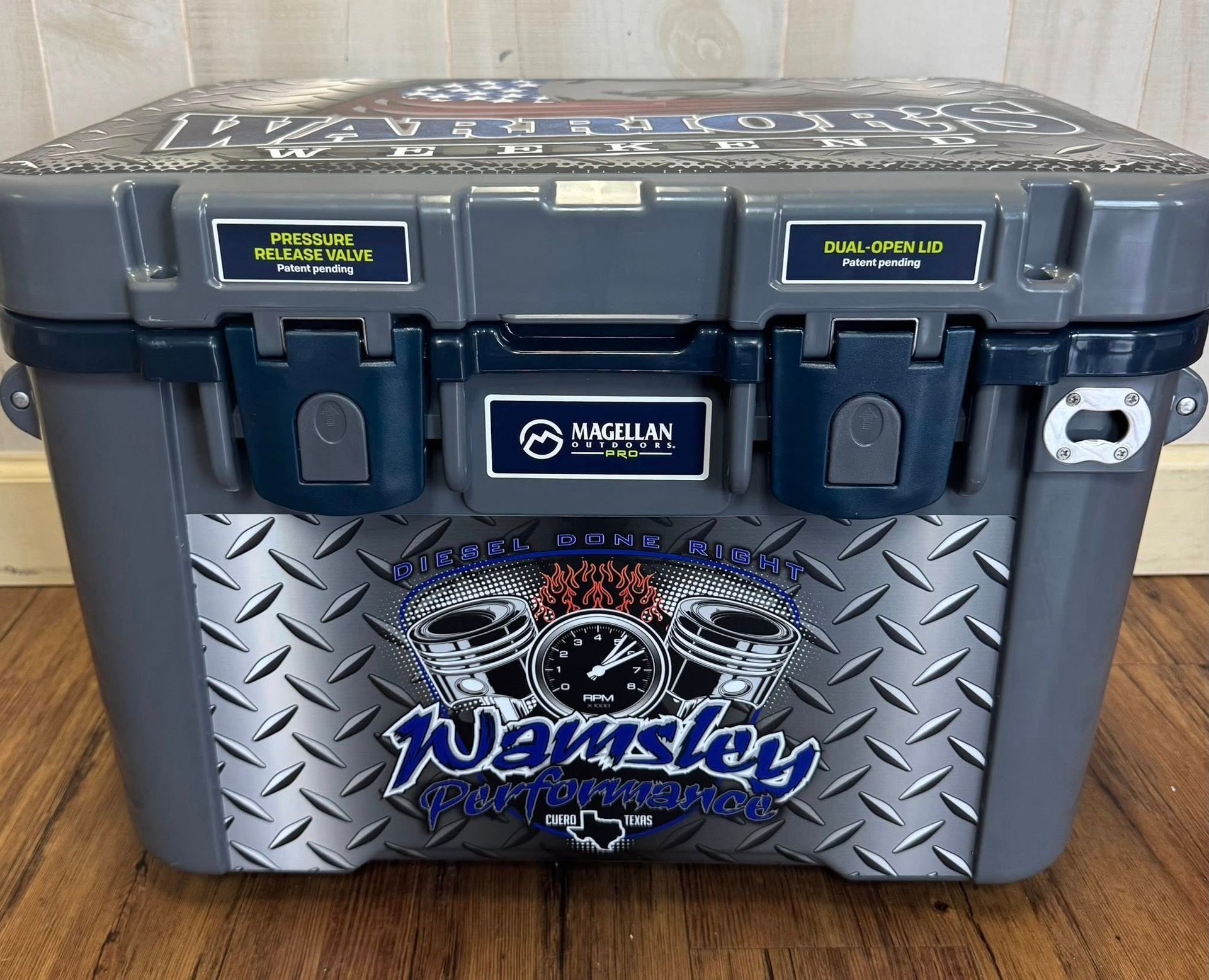 Gray cooler with custom graphics including a logo, name 