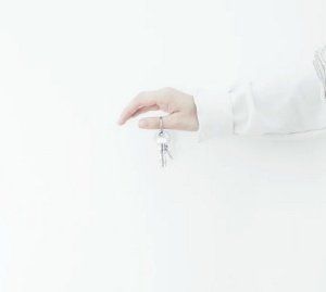 Hand With Keys — Coastal Furniture Removals in Hervey Bay, QLD