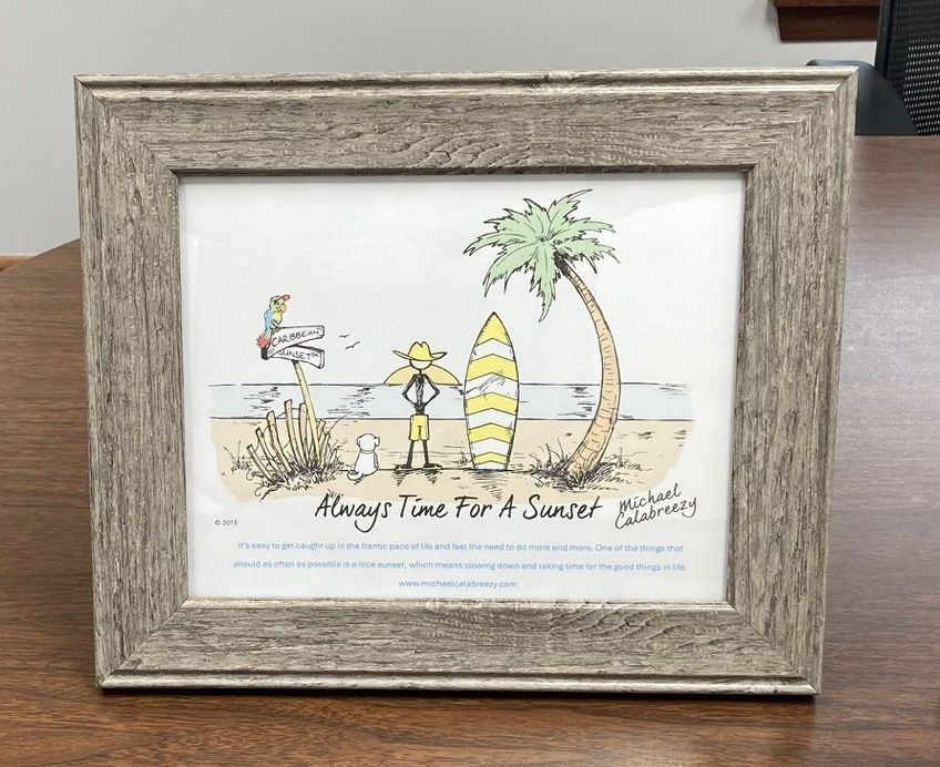 Framed beach scene cartoon. Person with surfboard, dog, and palm tree on a sandy beach. Text: 