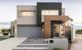 modern house with panelift garage doors