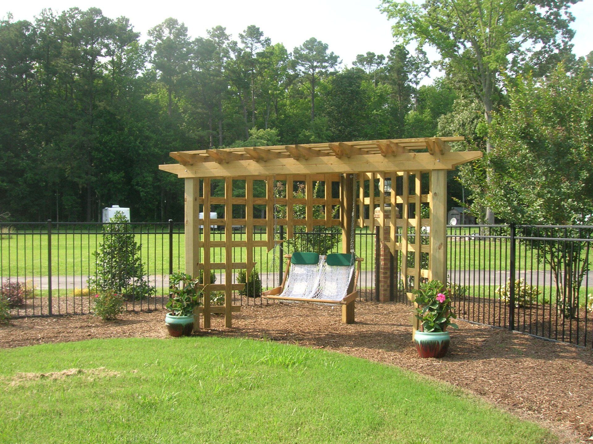 Risser Pergola with Swing — Chesapeake, VA — Brooks Landscaping, Inc.