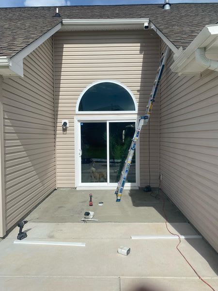 A house with a ladder in front of it
