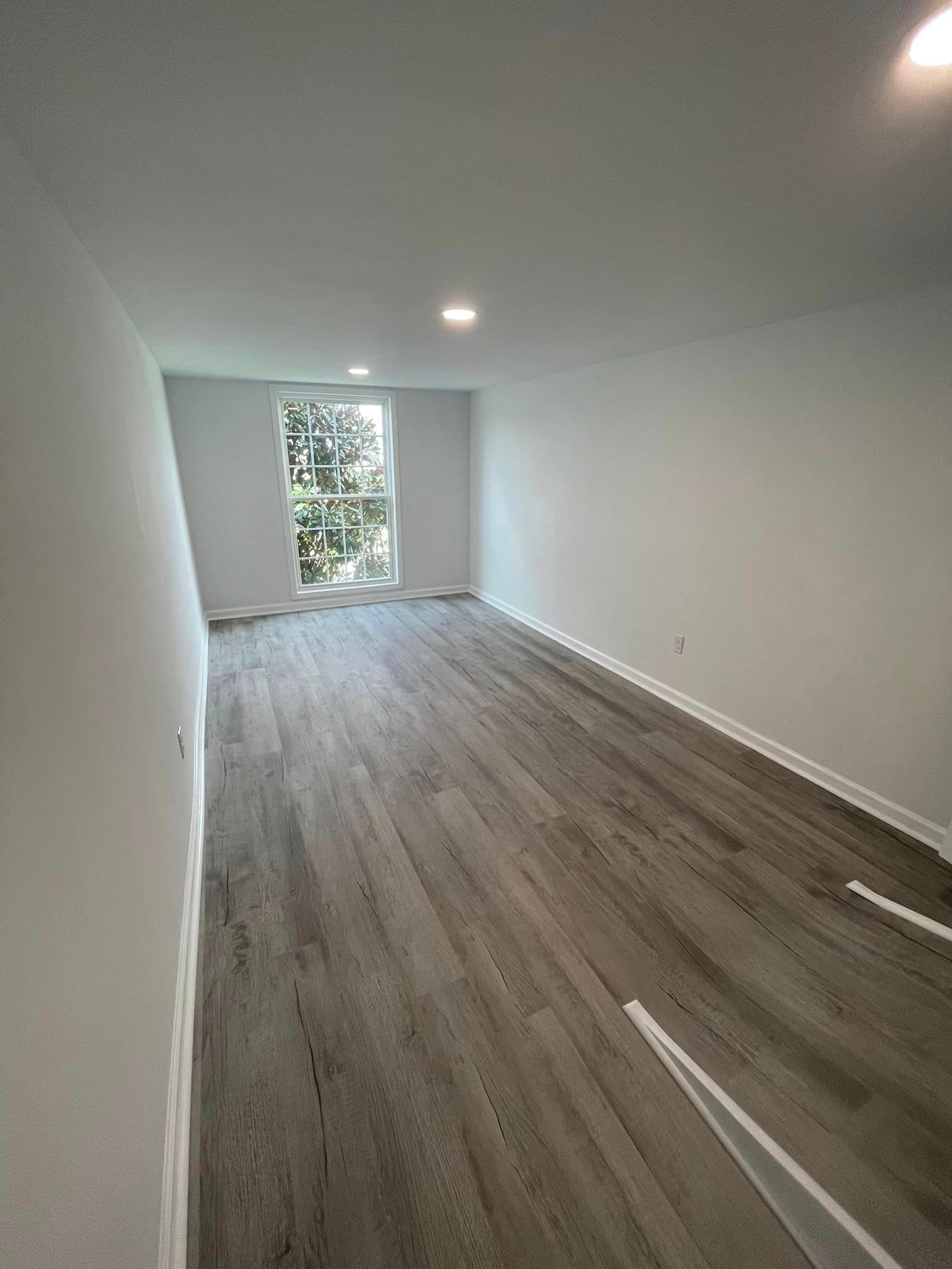 There is a large window in the middle of the room.