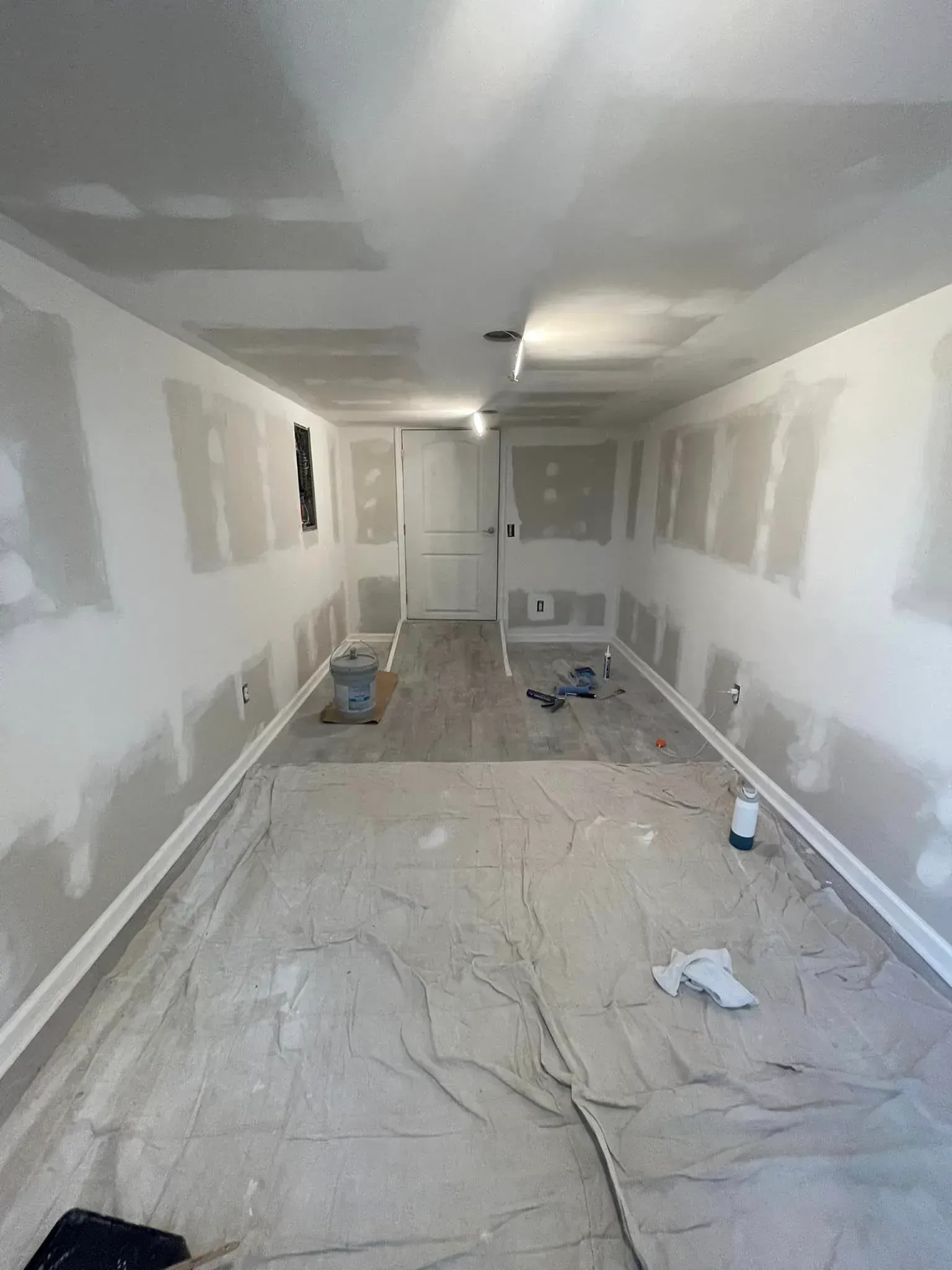 There is a large window in the middle of the room.