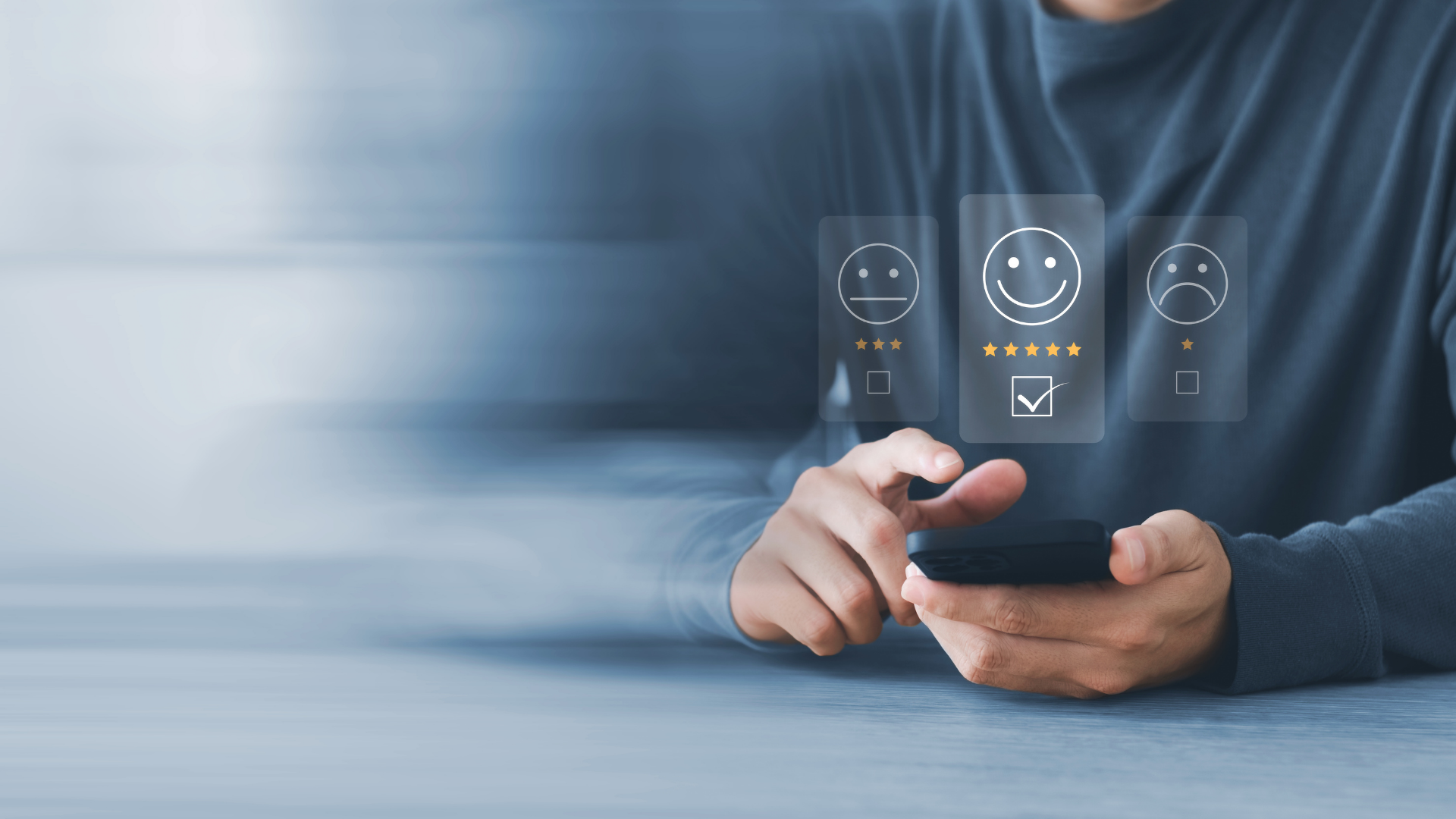 Person using a smartphone with floating smiley icons on a blue background