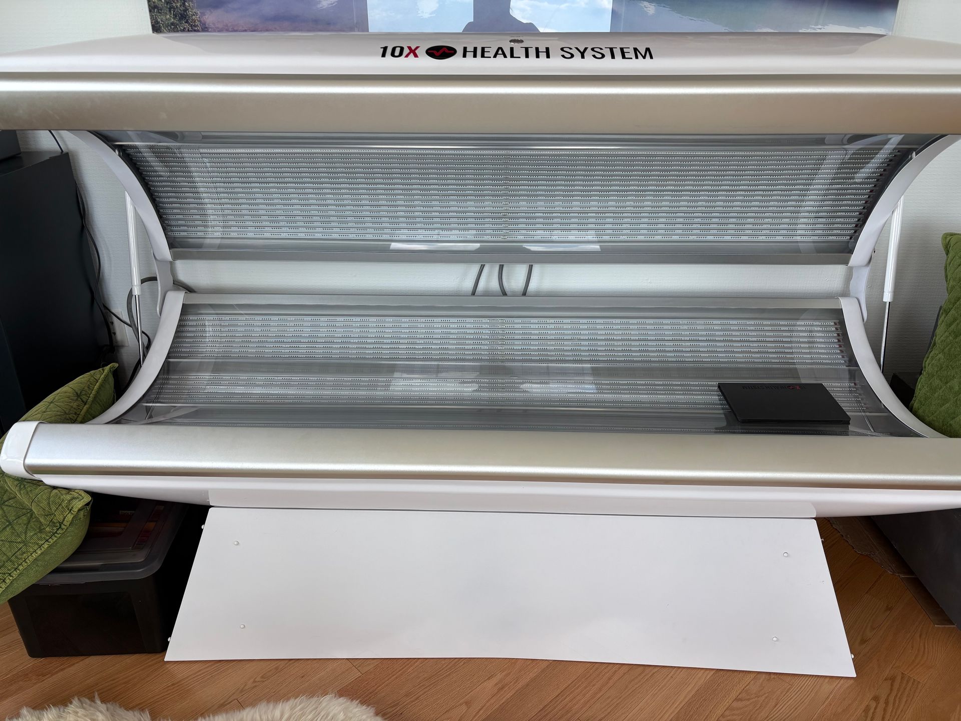 Medical device with a screen, nozzle, and tube, likely for medical procedures.