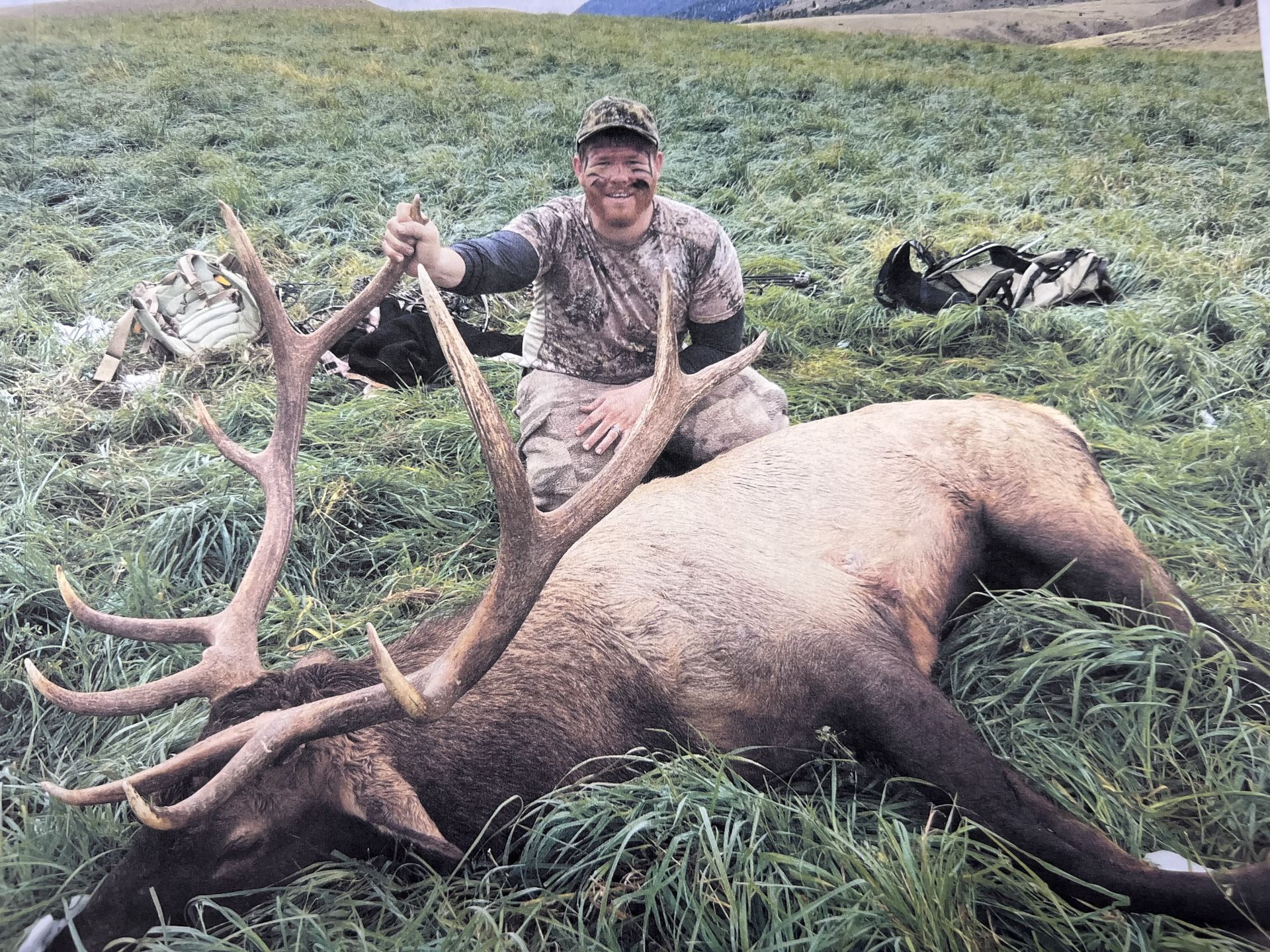hunter holding a large animal
