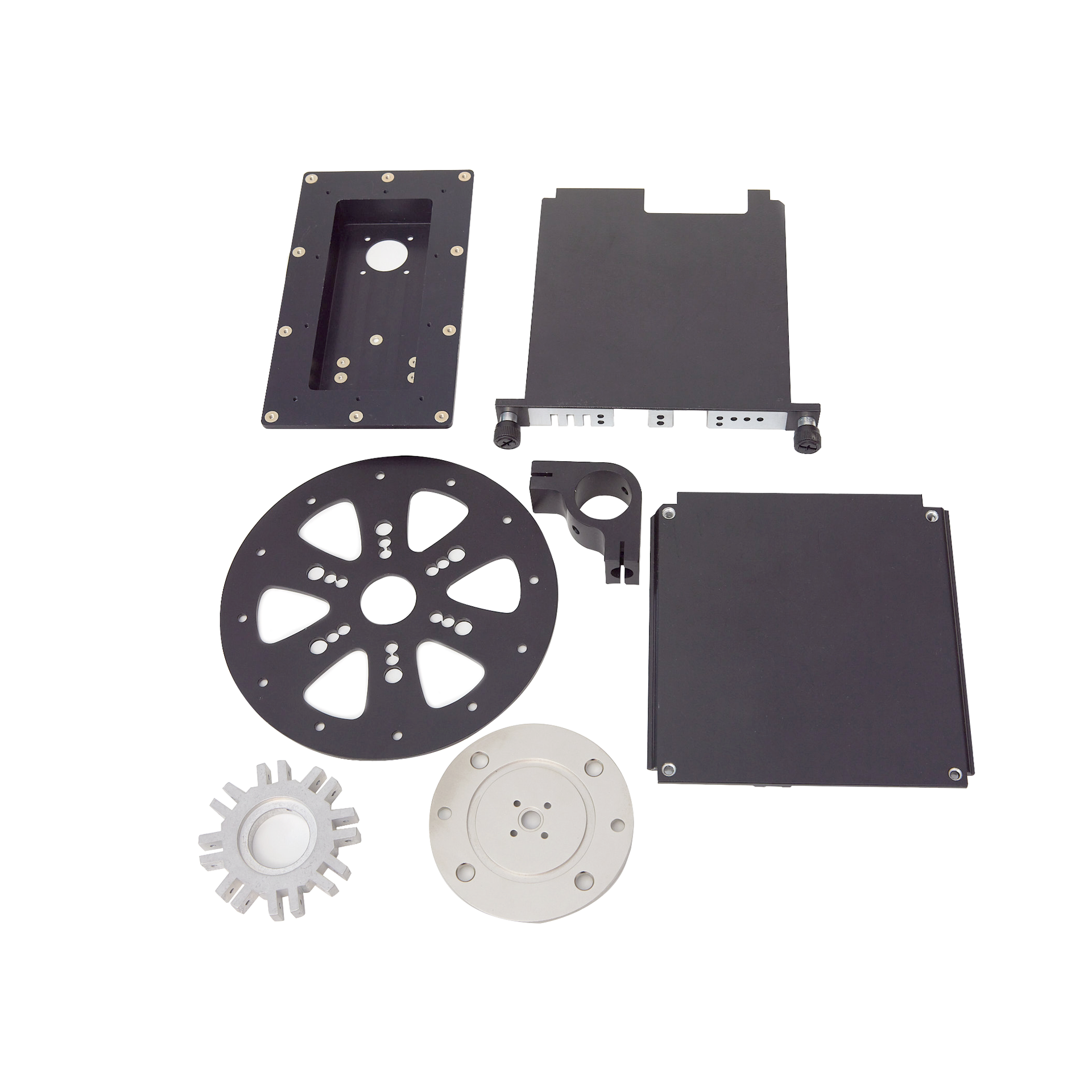 A bunch of different types of metal parts on a white background