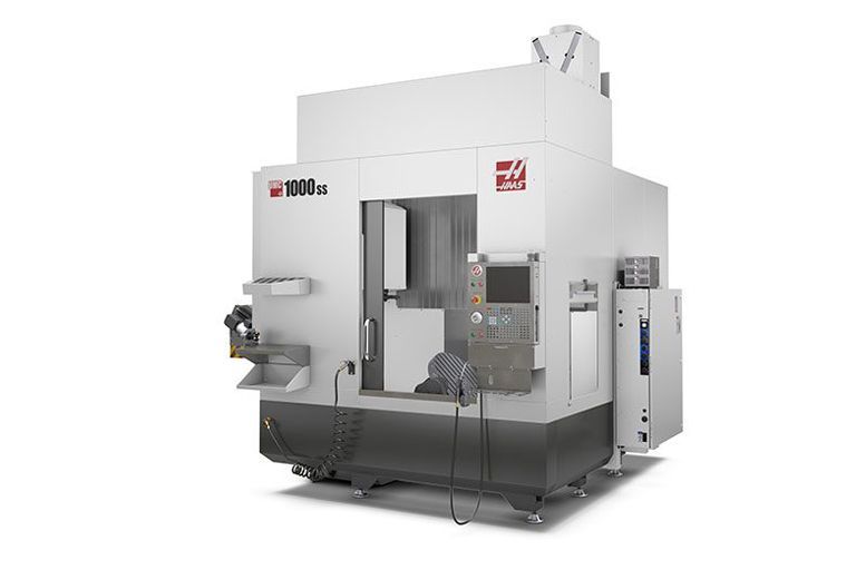 A large machine is sitting on a white surface.