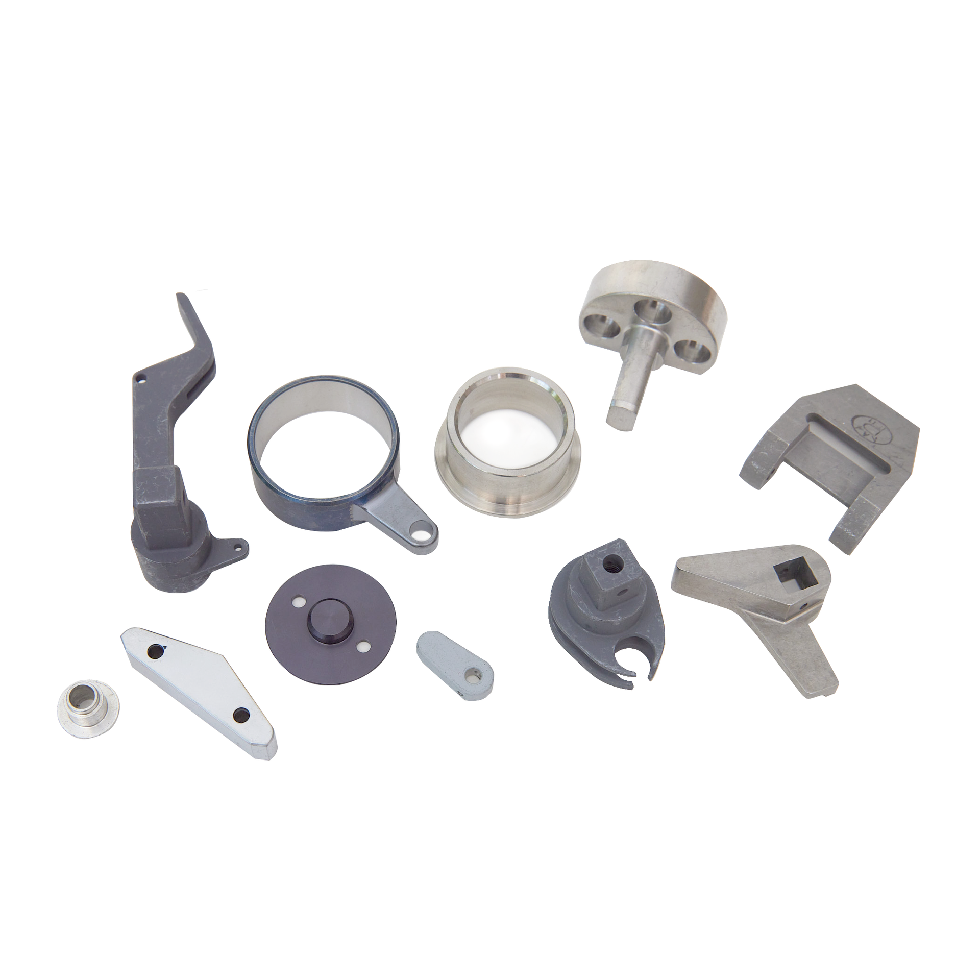 A bunch of different types of metal parts on a white background