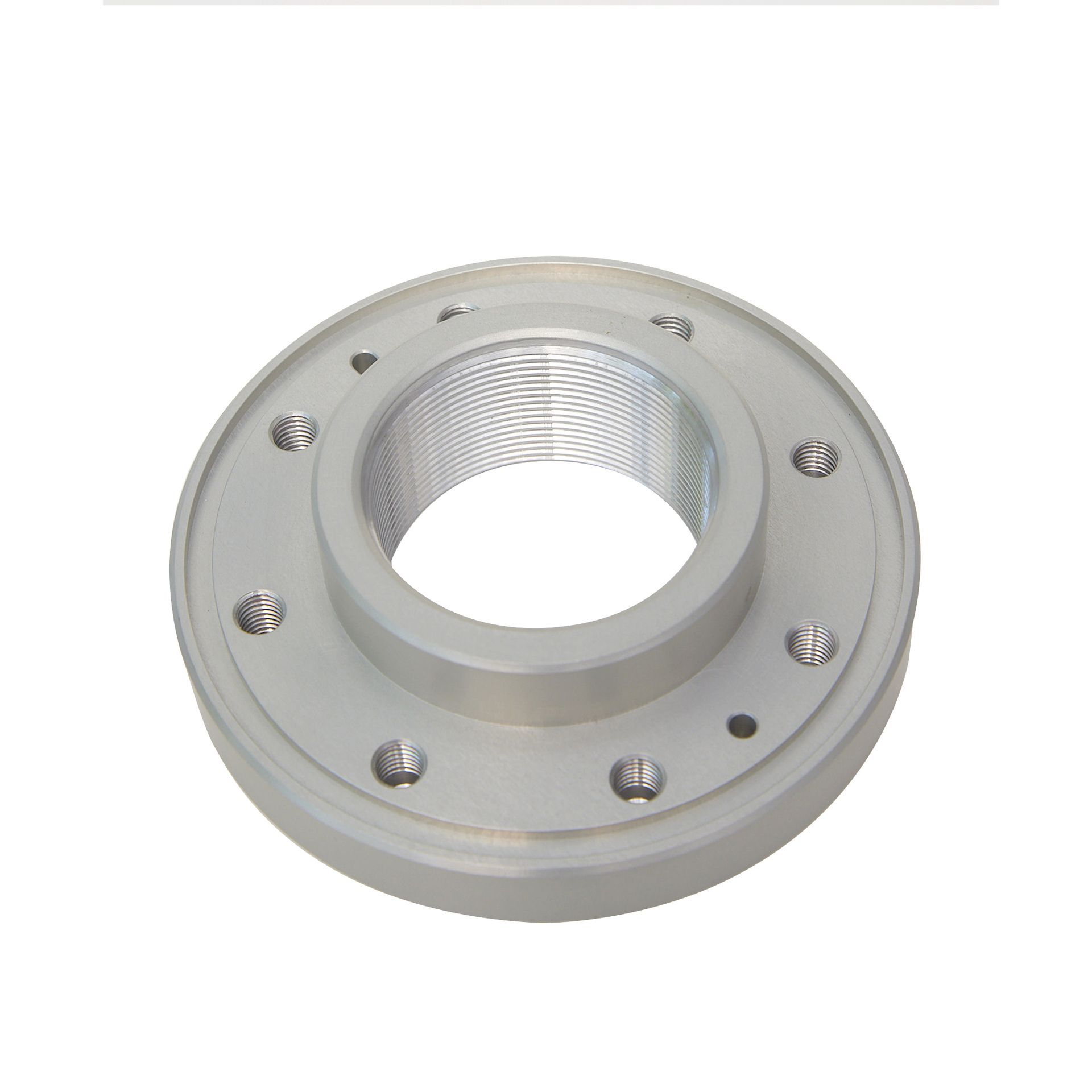 A metal ring with holes in it on a white background