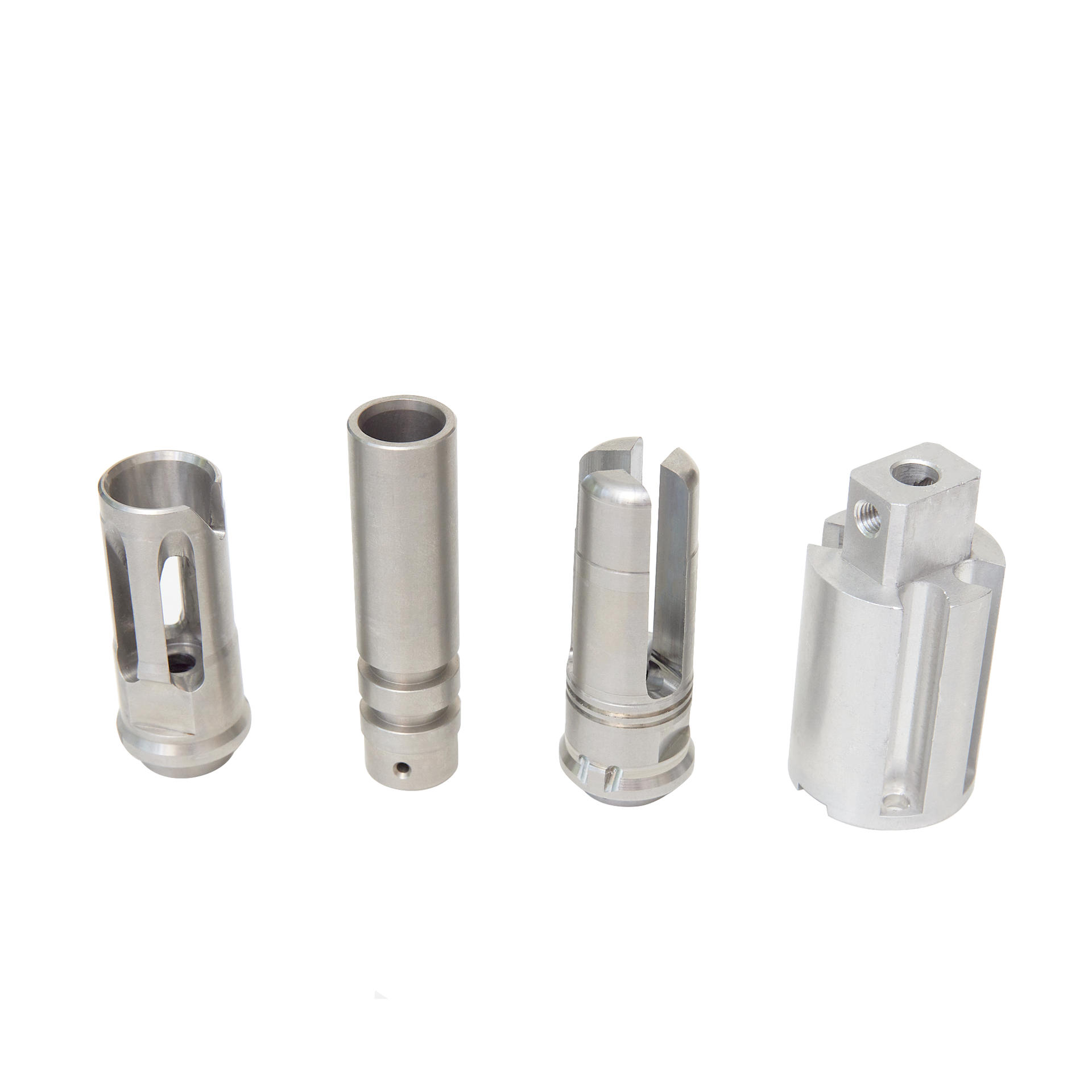 A group of stainless steel cylinders are sitting next to each other on a white surface.