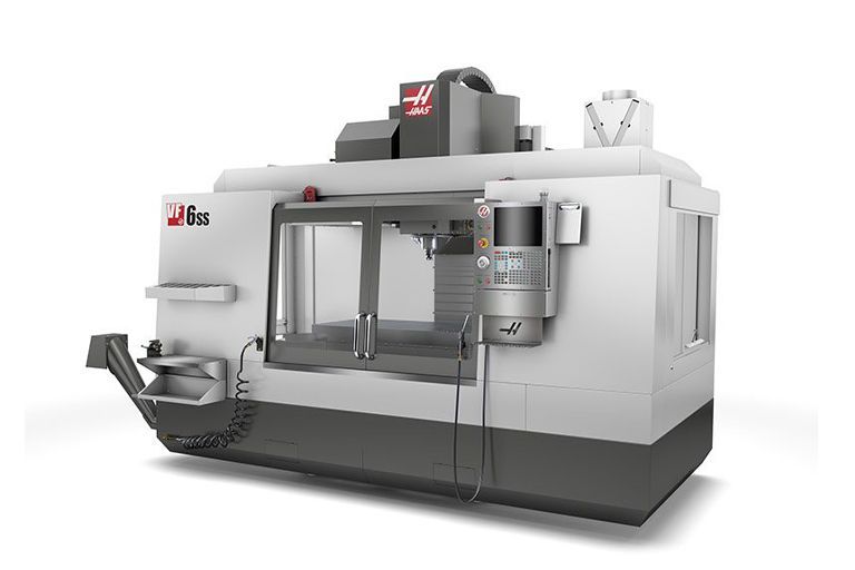 A large machine is sitting on a white surface.