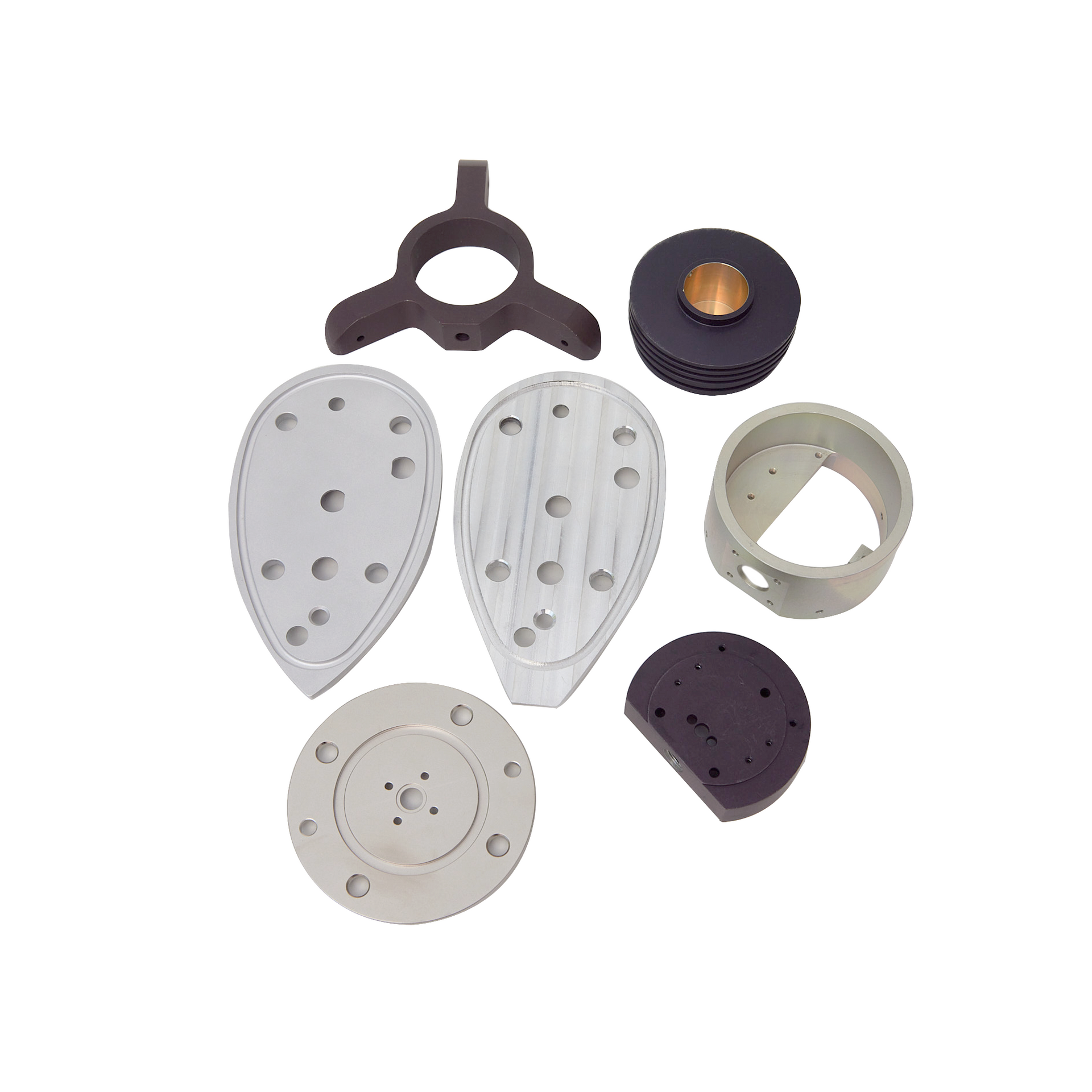 A group of plastic parts are sitting on top of each other on a white surface.