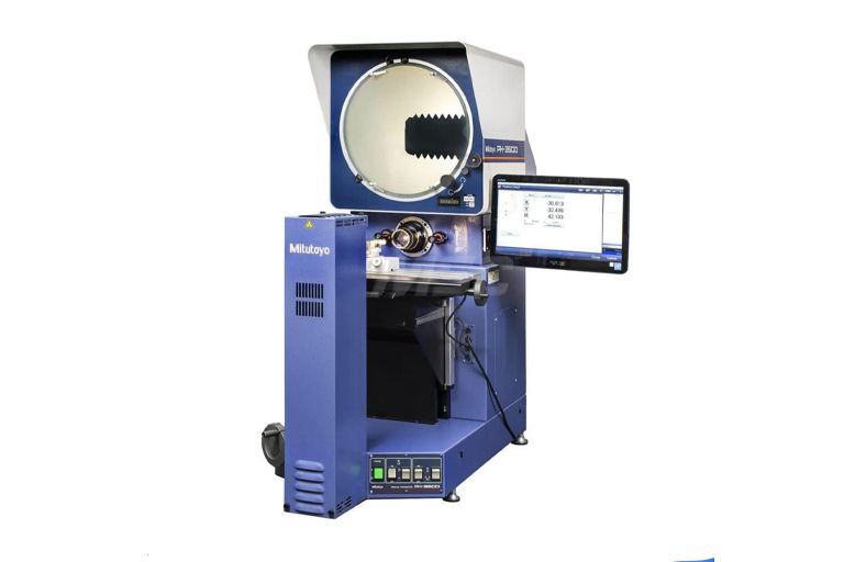 A blue machine with a computer monitor attached to it.