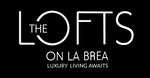 Logo for The Lofts on La Brea, white text on black background. "The Lofts" above "On La Brea" and "Luxury Living Awaits".