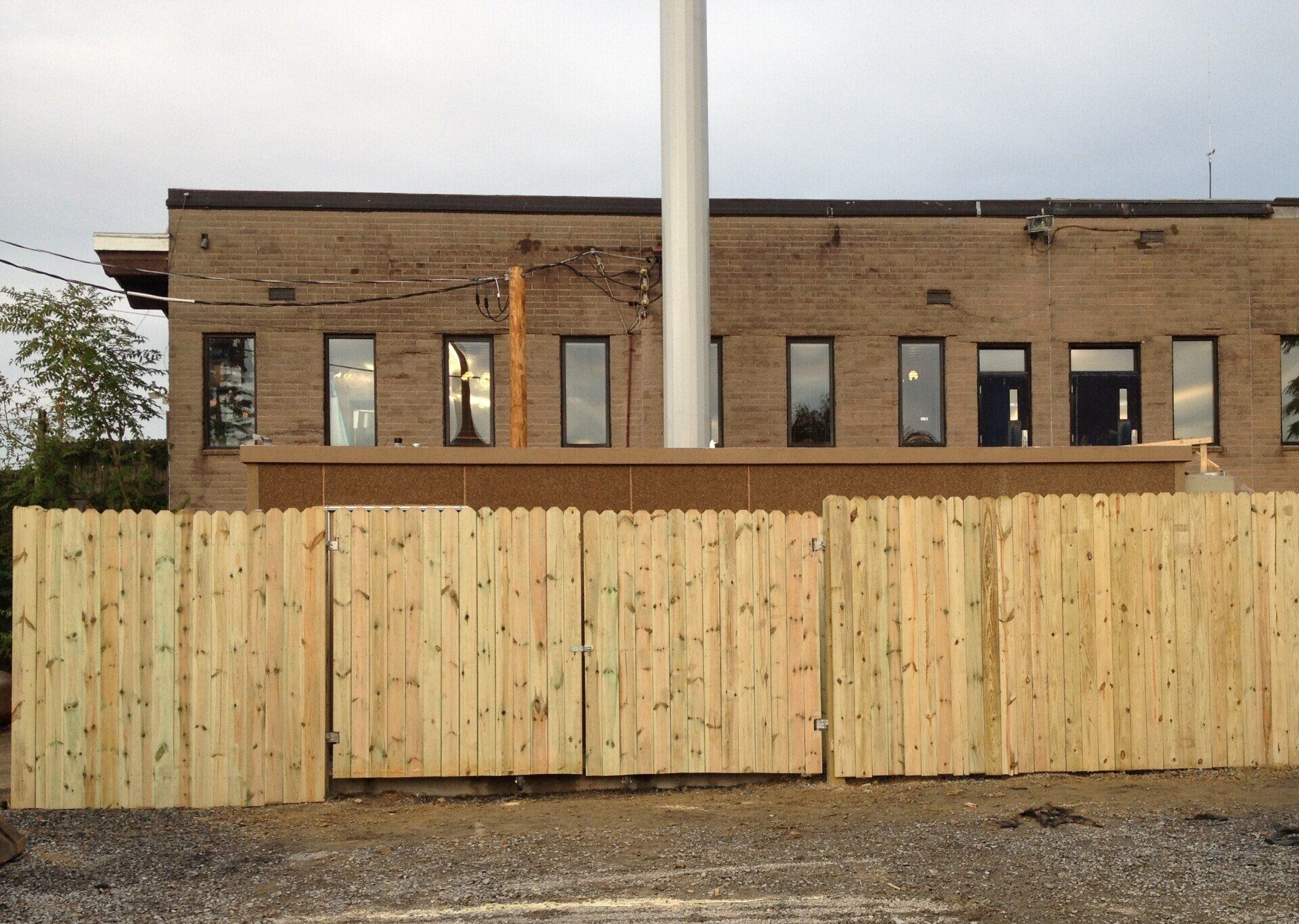 Wood privacy fence installed by Metal Fence Supply Co.