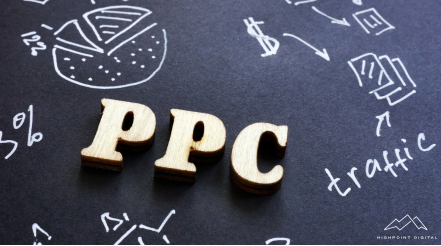 A sign that says pay per click on it