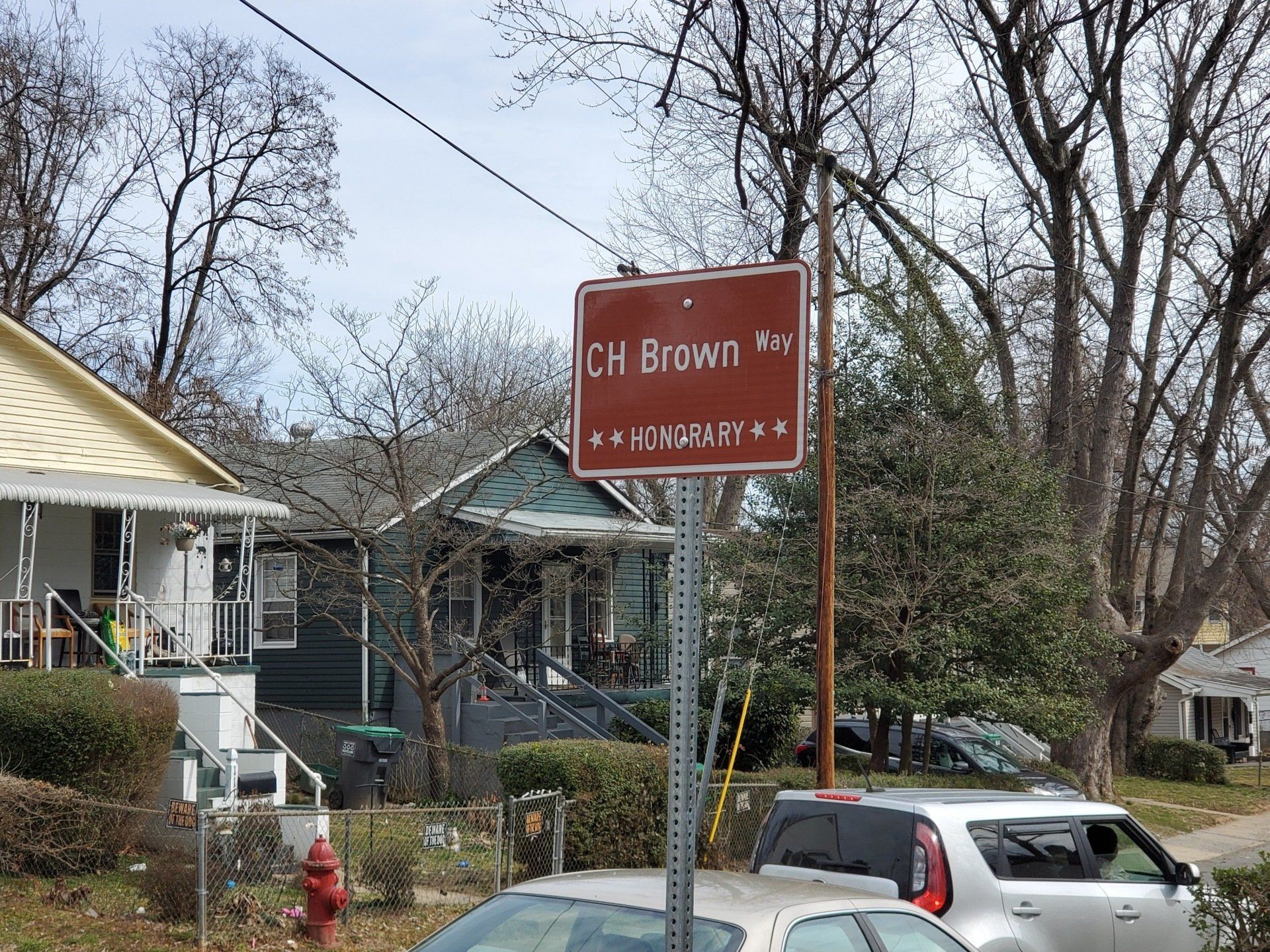 A red sign that says ch brown on it