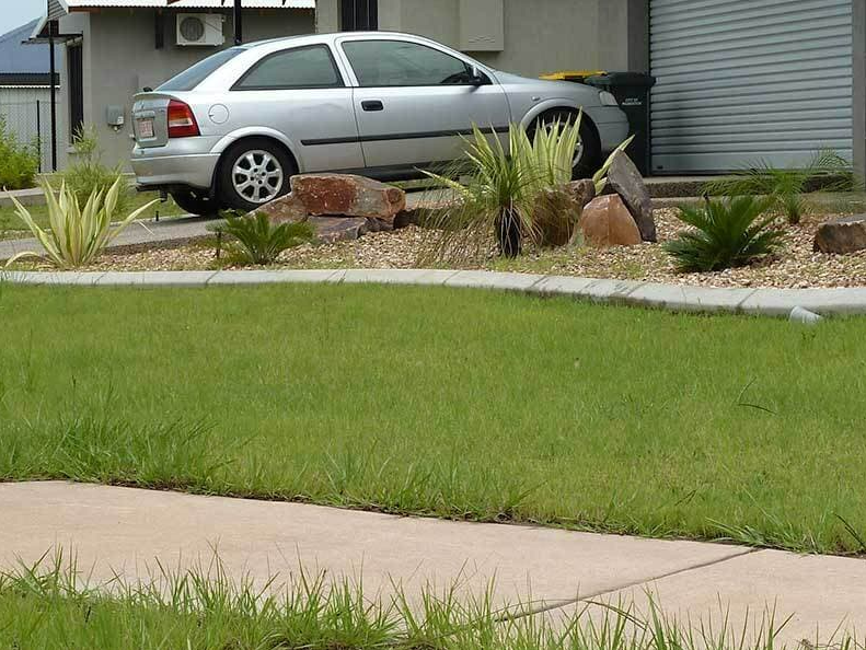 Car Parked in Driveway — Landscaping in Palmerston, NT