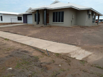A House with a Sidewalk Under Construction — Landscaping in Palmerston, NT