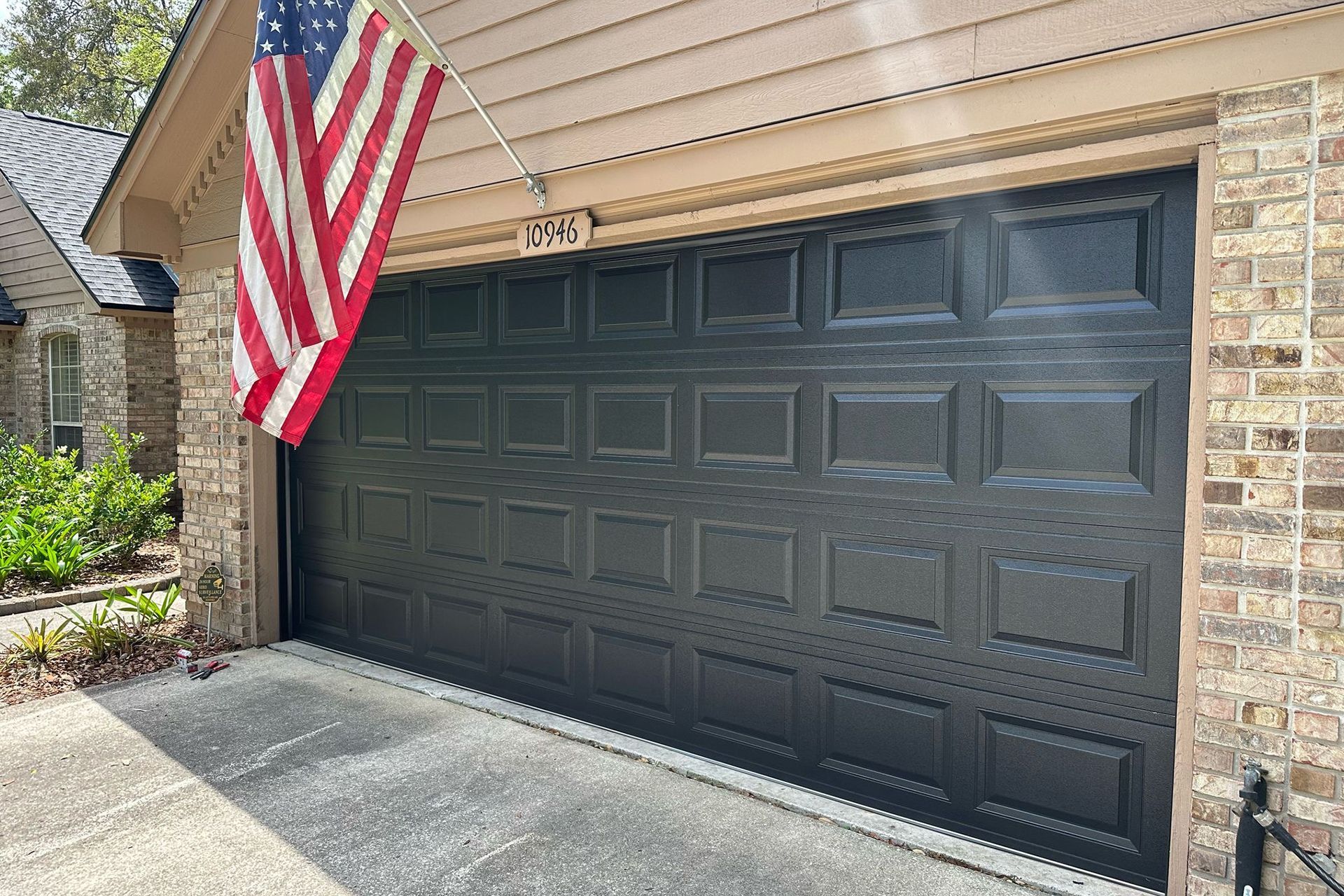 Replace damaged garage door panel

