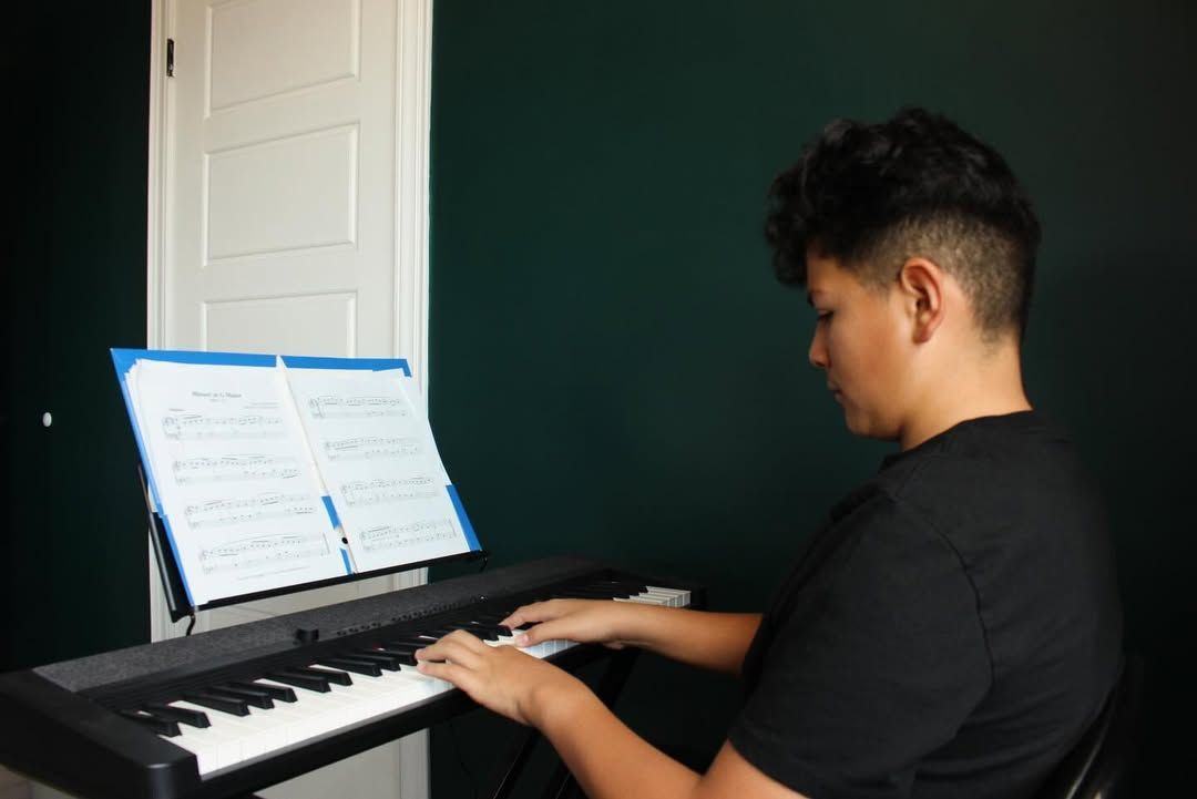 Boy playing piano
