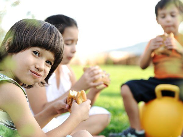 Children Eating Outdoors — Louisiana — DA Exterminating