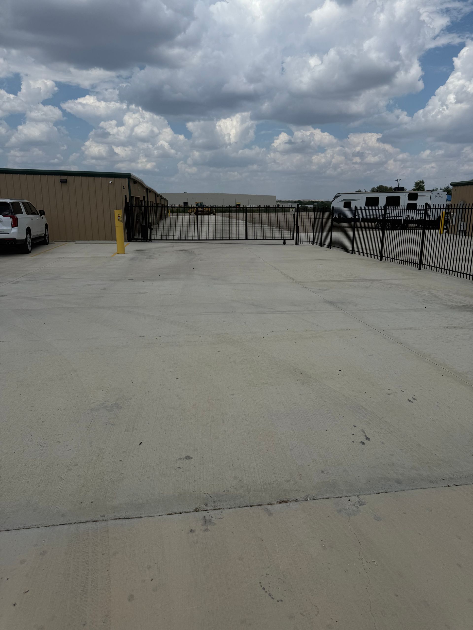 An empty road with a building in the background