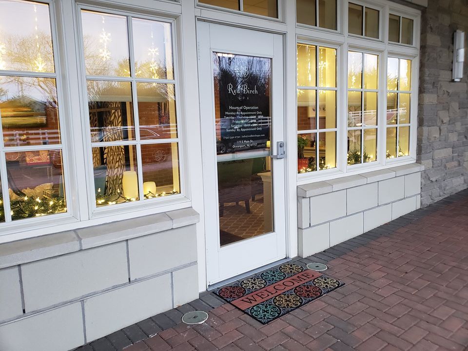 White Windows with White Door in Side View — Oceanport, NJ — Red Birch Spa