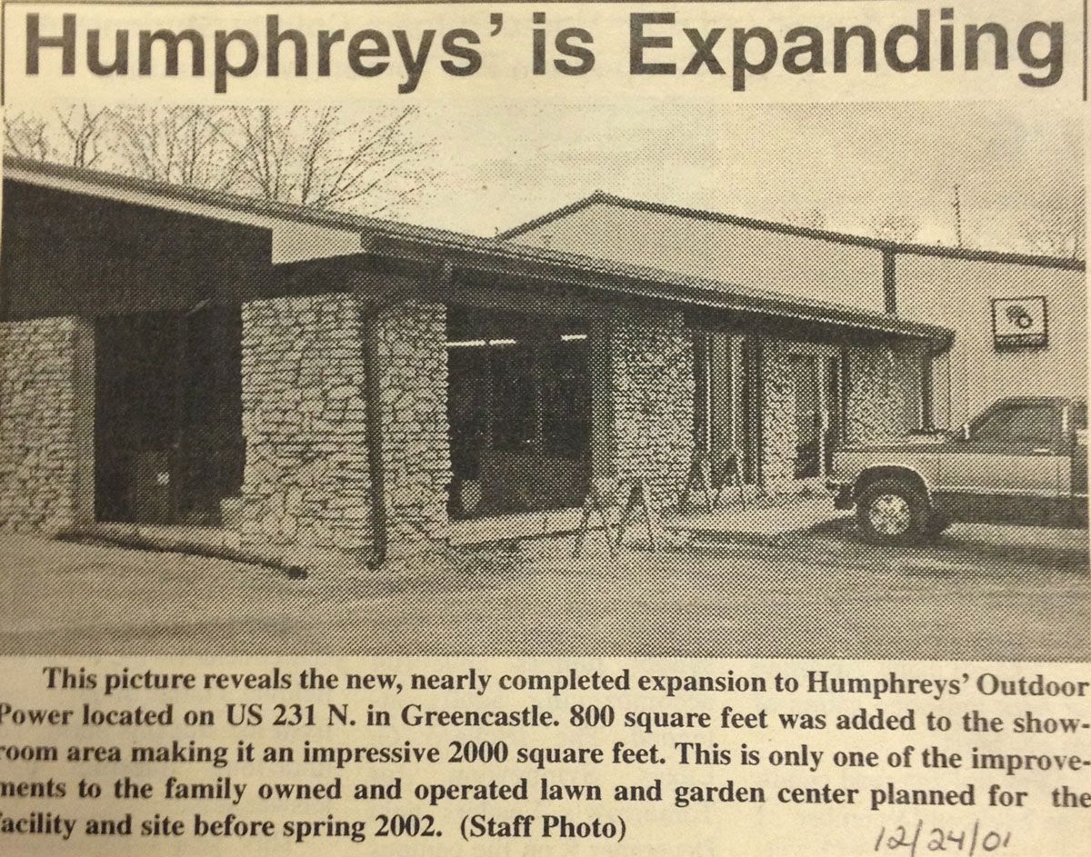 Black and white photo of Humphreys' Outdoor Power building expansion on US 231 N. Text: 