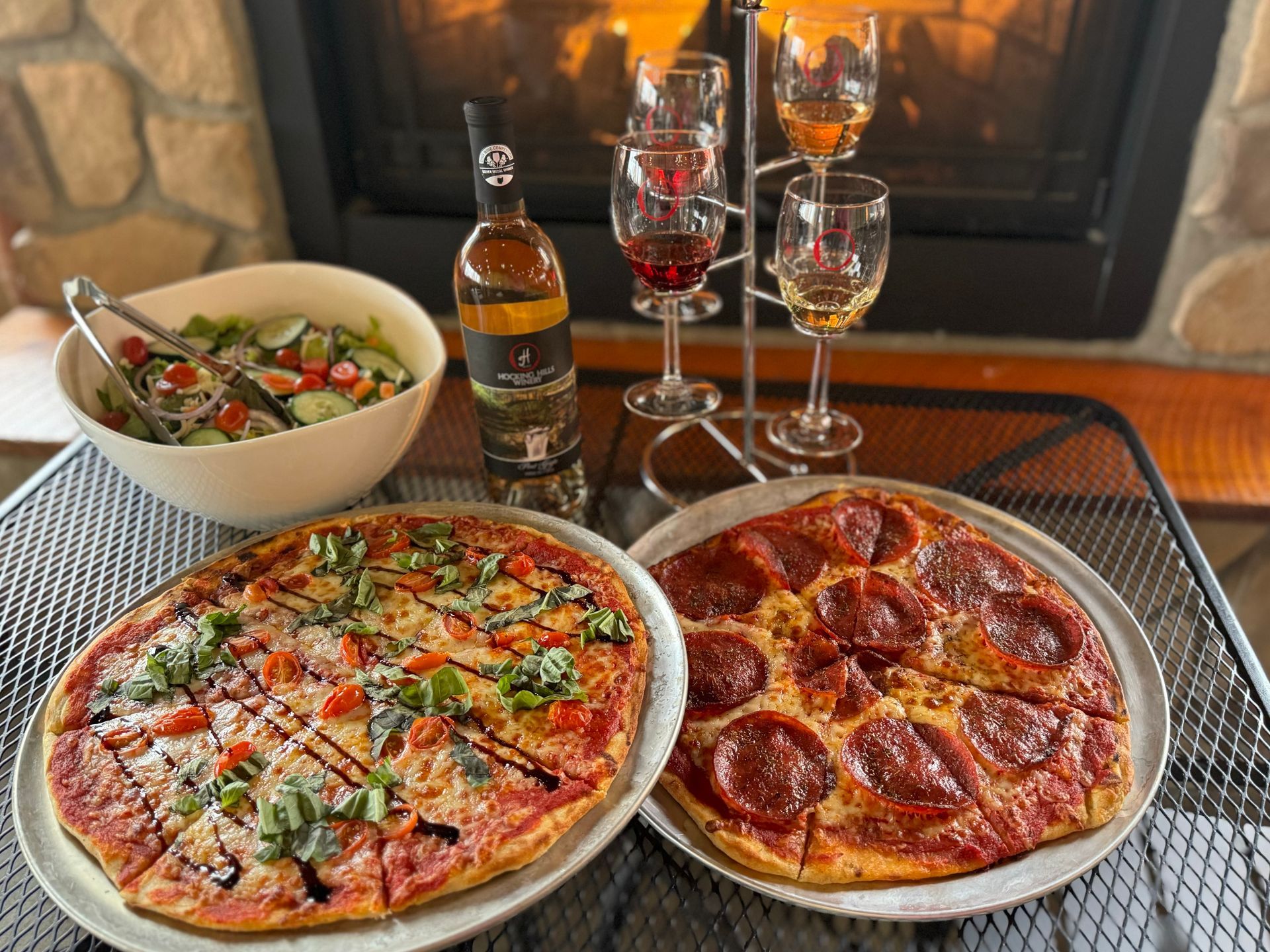 pizza and salad with a wine flight