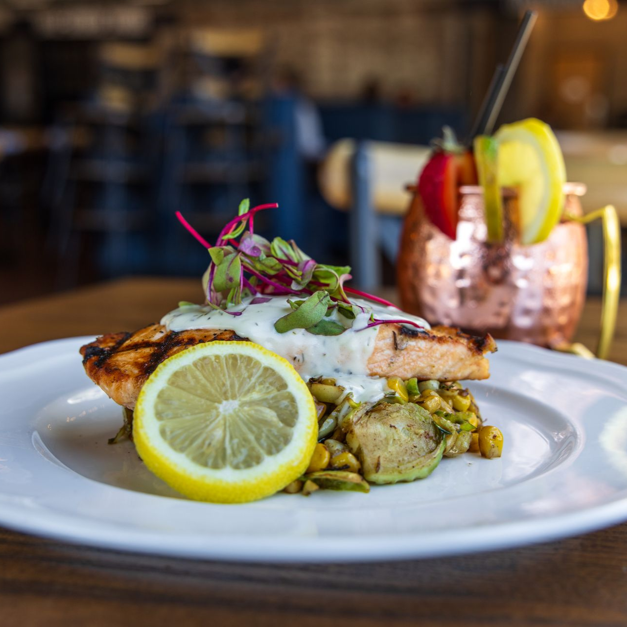 Salmon entree on a white plate