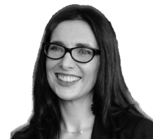 Man in a suit and tie, looking directly at the viewer with a neutral expression.