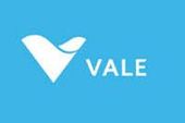 A white abstract V-shaped logo and the text 