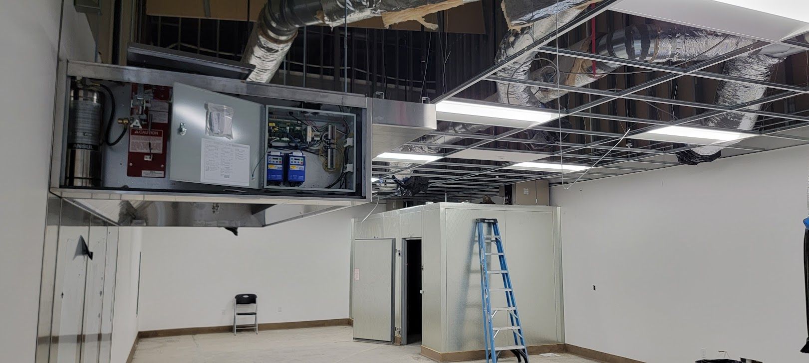 There is a ladder in the middle of the room.