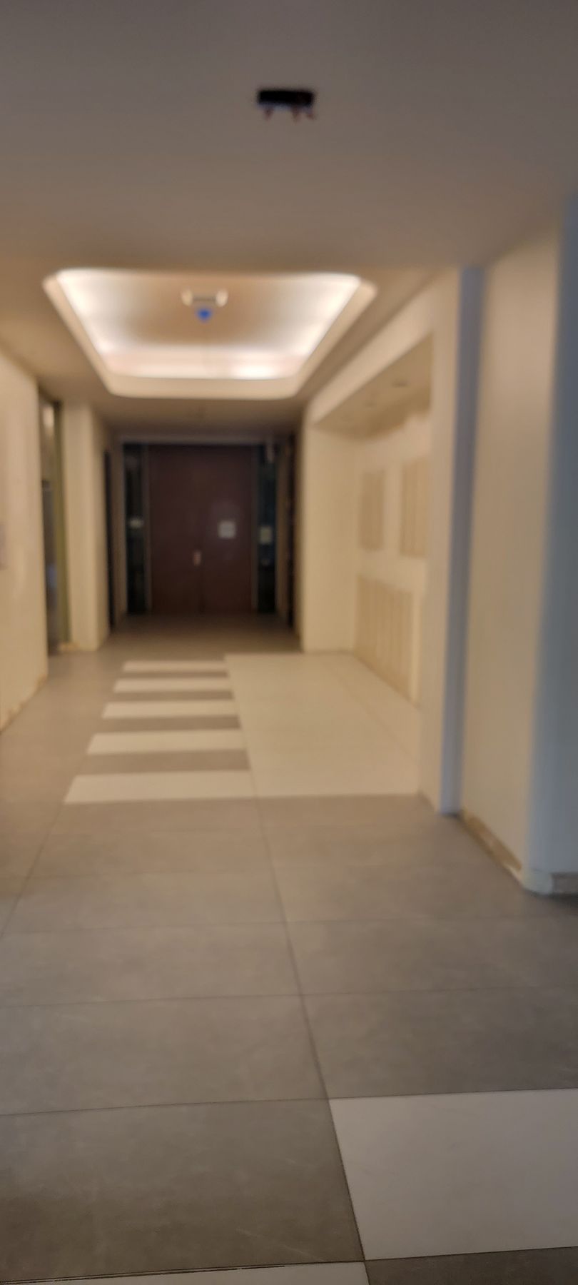 There is a crosswalk in the middle of the hallway.