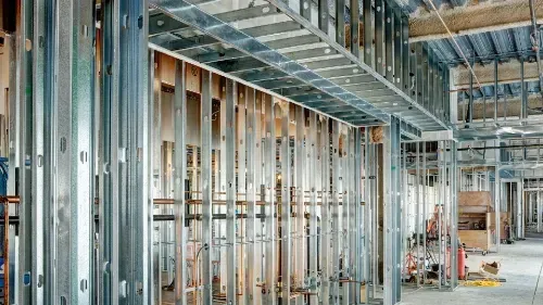 A close up of a steel stud framing.