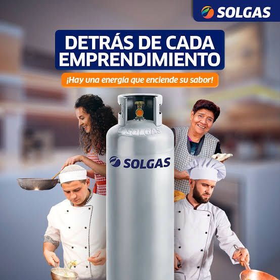 Anuncio de Solgas con una bombona de gas y gente cocinando. 