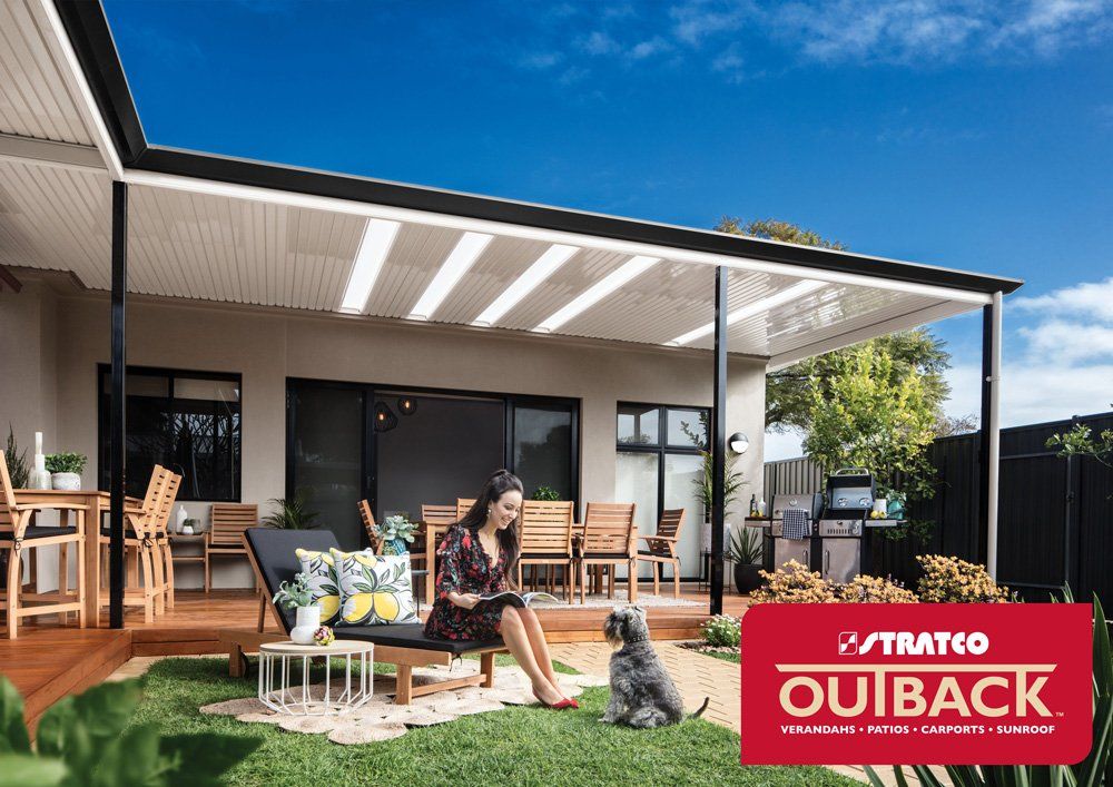 Lady Playing with Her Dog — Geelong, VIC — Absolute Patios