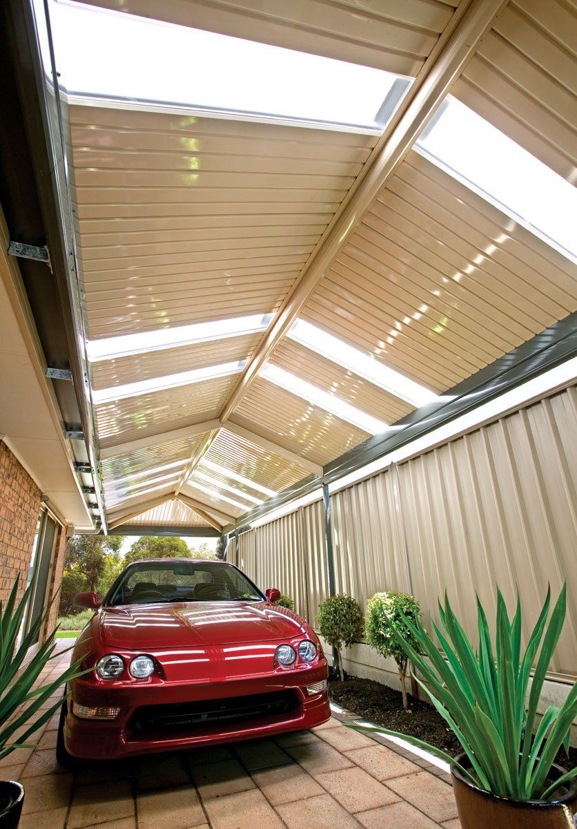 Red Car on Parking — Geelong, VIC — Absolute Patios