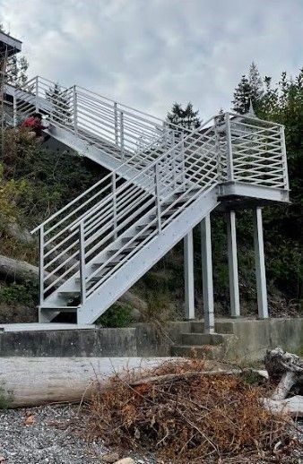 custom-metal-beach-access-staircase-being-installed 2