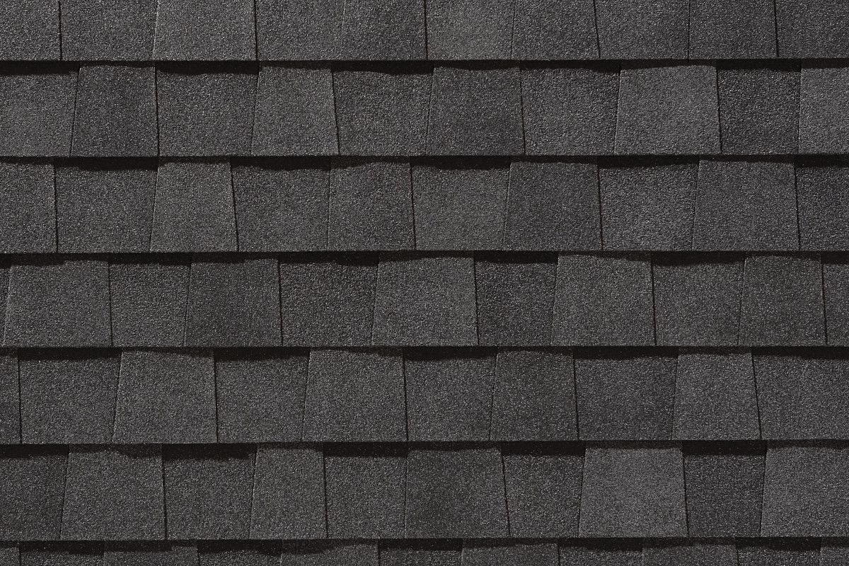 Dark gray asphalt roof shingles.