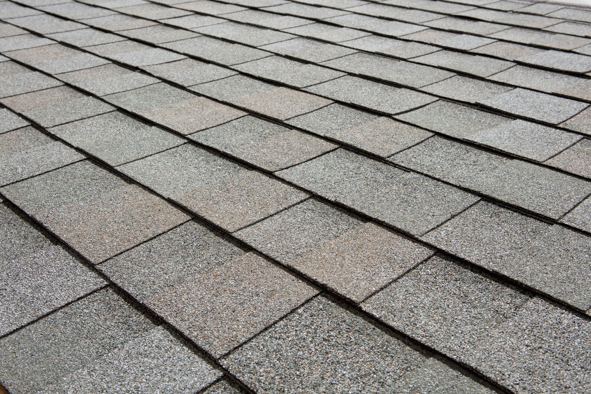 Gray asphalt shingle roof.