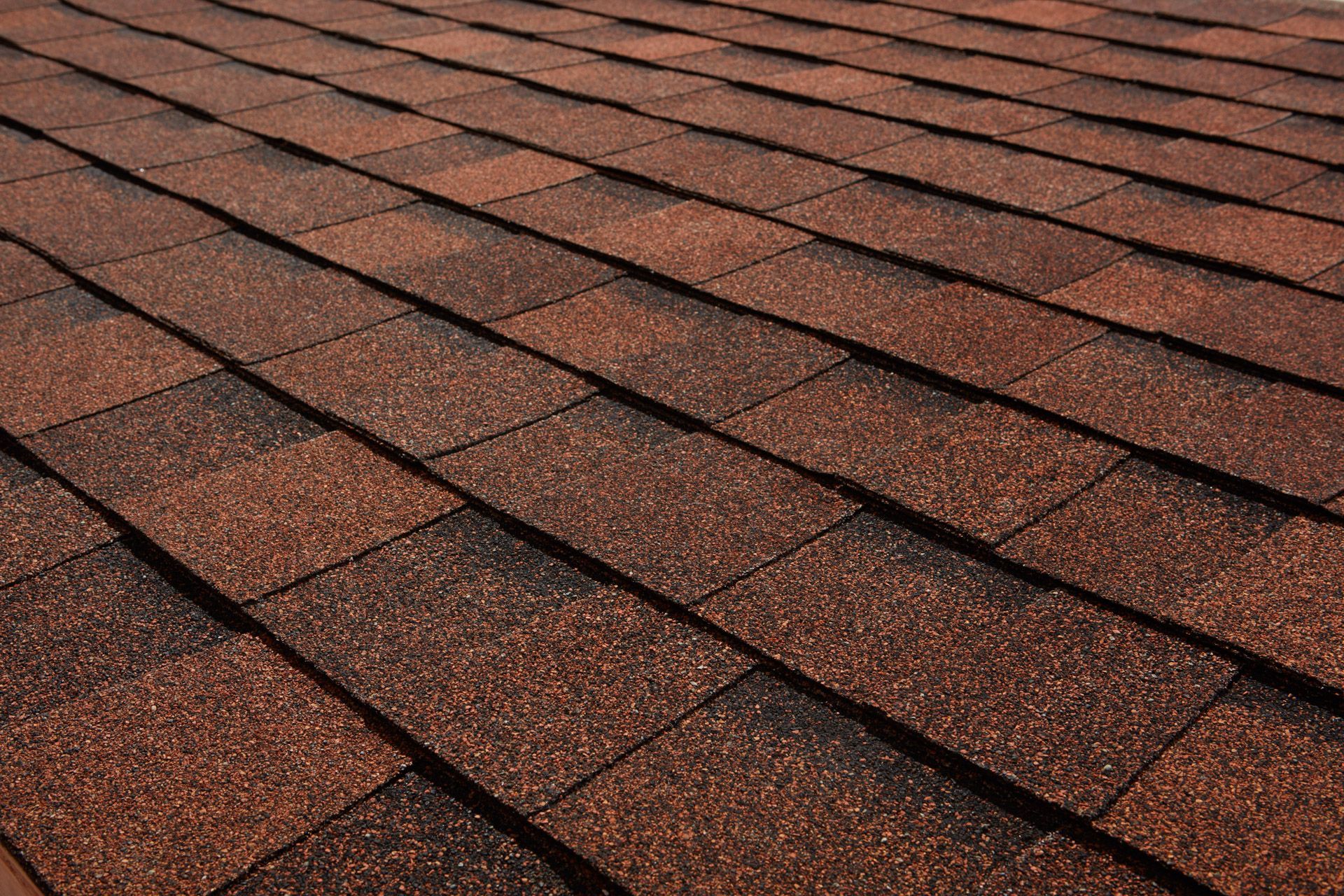 Brown asphalt shingle roof.