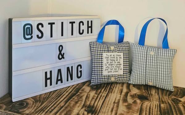 hanging cushions made from a loved ones shirt and buttons