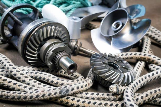 A pile of gears and ropes on a table