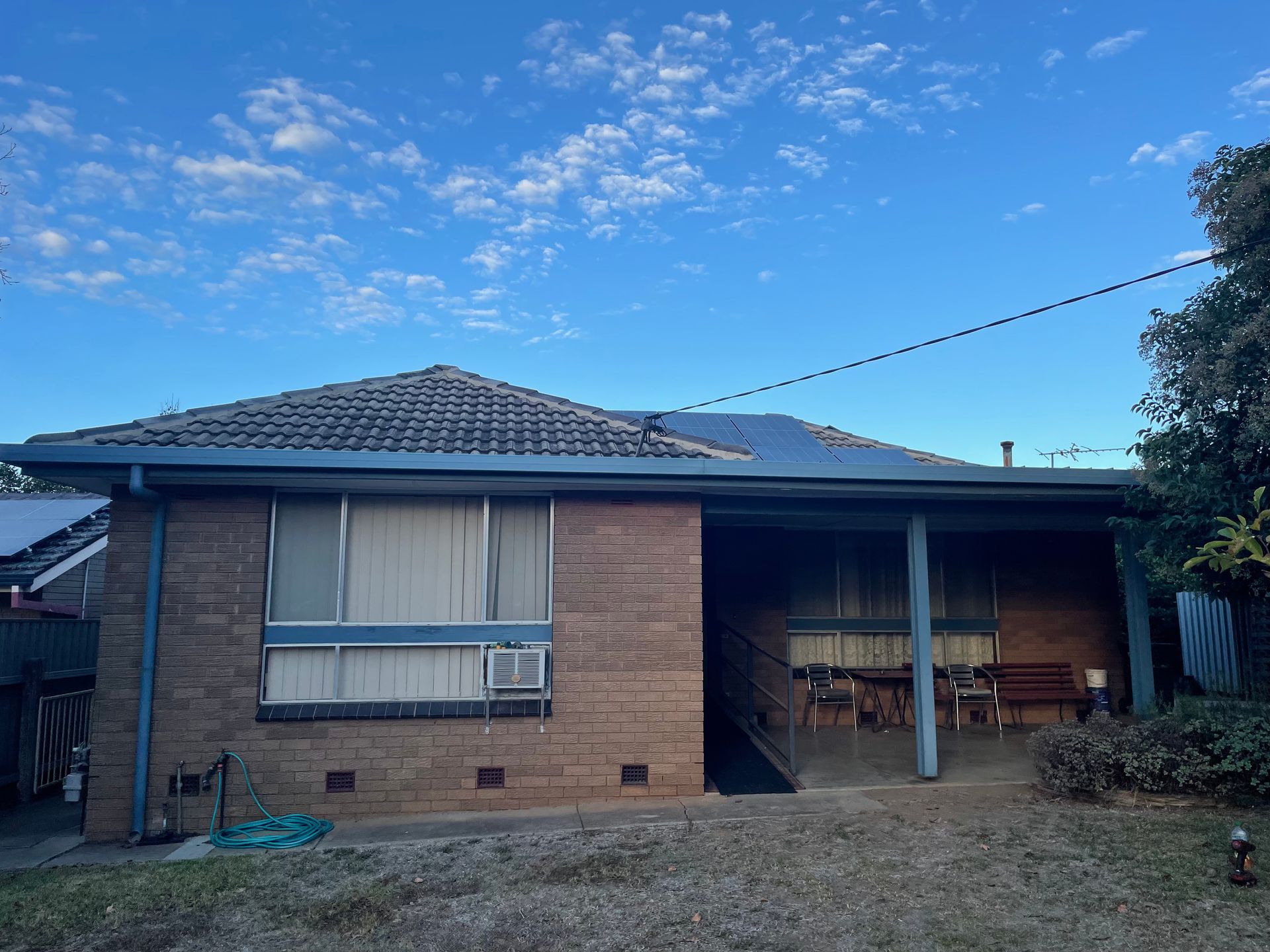 Two Workers Are Changing Roofs — Stephen Meaker Roofing in Wagga Wagga, NSW