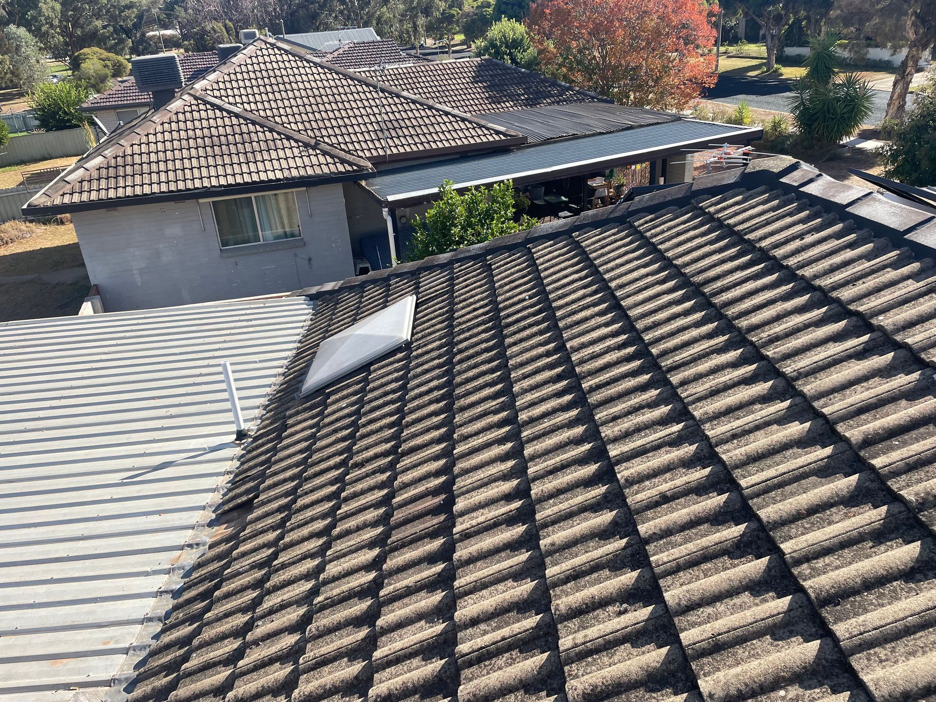 The roof of a house with solar panels on it — Stephen Meaker Roofing in Wagga Wagga, NSW